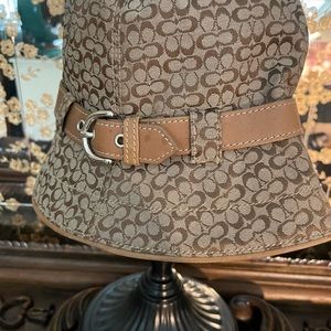 Coach y2k bucket hat with leather belt and trim